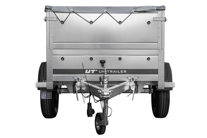 Unitrailer GARDEN TRAILER 150 KIPP met een steunwiel, twee zijkanten en een grijze platte afdekking op een frame