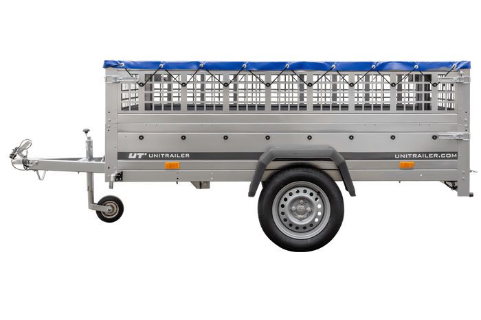 Lichte aanhanger 230x125 UNITRAILER GARDEN 230 KIPP met gaaswanden en H-0 frame en blauwe hoes